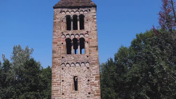 Above View of Isolated Old Catholic Christian Romanesque Church with Bell Tower in Nature Outdoor