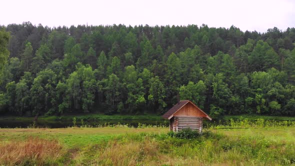 Russian Nature with a Wooden Bath By the River