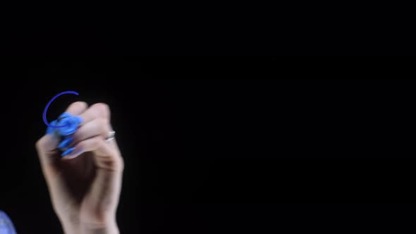 A Woman's Hand Writes the Word Credit on a Transparent Whiteboard Against a Black Background