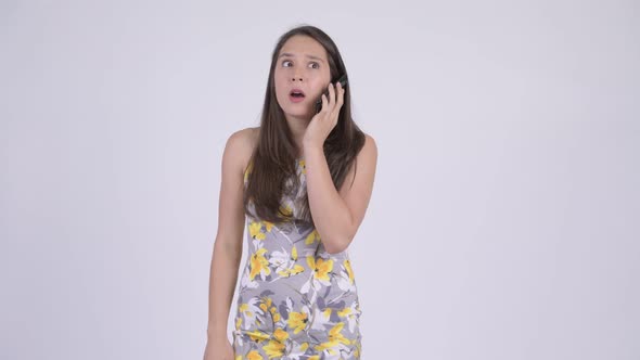 Young Happy Multi-ethnic Tourist Woman Talking on the Phone