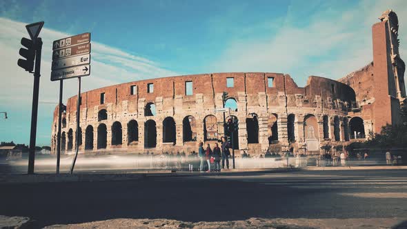 People Walking on Square Near Colosseum in Rome