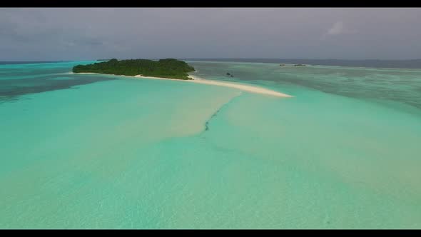 Aerial abstract of luxury resort beach adventure by blue ocean and white sandy background of a dayou