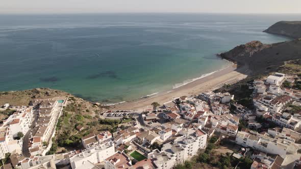 Panoramic view of Burgau beach and seaside town, Algarve.  Beach holidays paradise