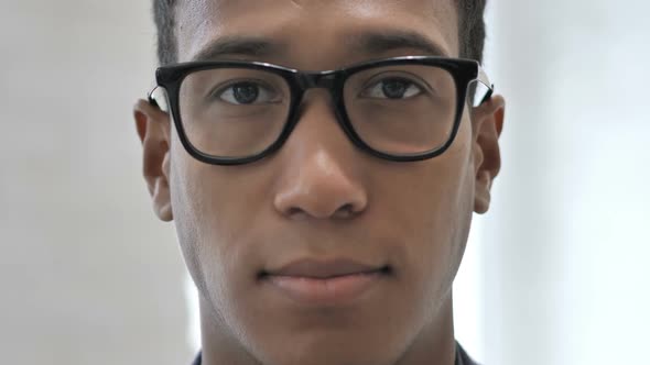 Face of African Man with Toothache Close Up