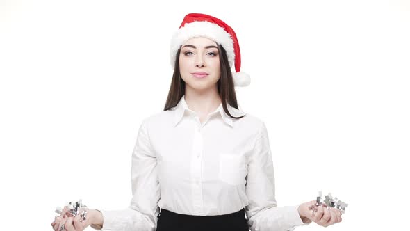 Slow Motion Young Attractive Businesswoman Throwing Silver Confetti Celebrating for Christmas and