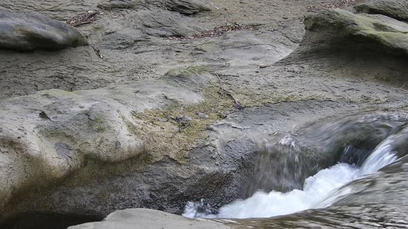 rapid river stream waterfall. River side with stones