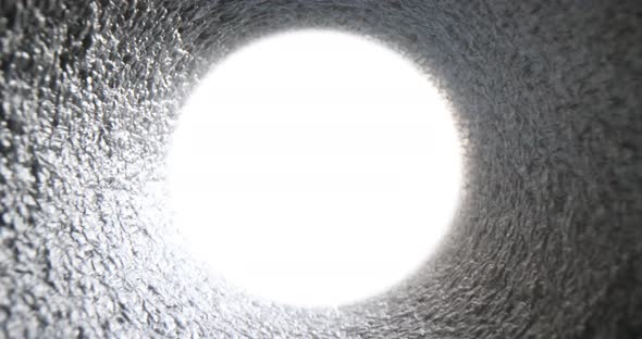 Light at End of Tunnel or Pipe Closeup