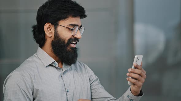 Arab Bearded Man Businessman Entrepreneur Investor Hold Video Communication with Business Partners