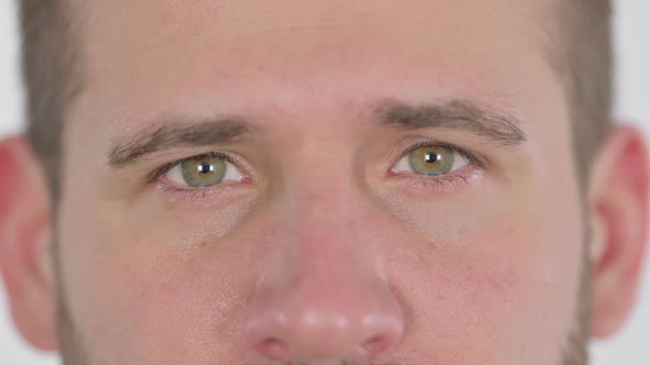 Close Up of Blinking Eyes of Middle Aged Man