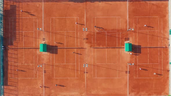 Aerial View of Tennis Court During a Match