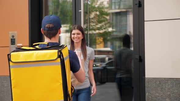 Positive Food Delivery Man Courier with Thermal Backpack Deliver Order Woman