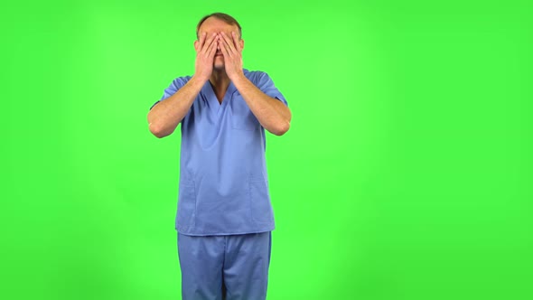 Medical Man Suffering From Headache From Fatigue, Green Screen