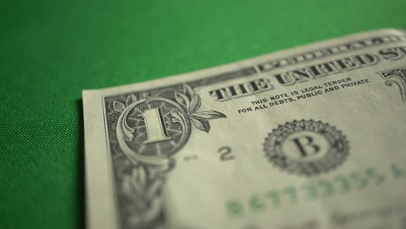 One 1 Dollar Bill On Table Isolated On Chroma Key Green Screen Background