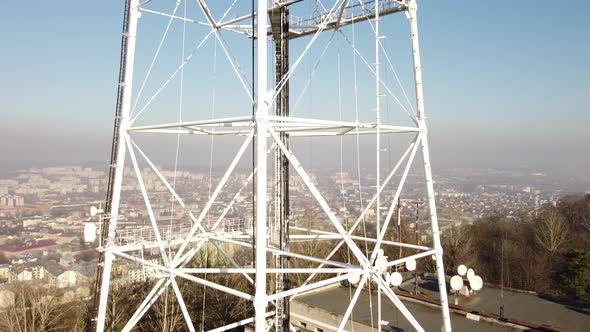 Aerial view of a drone flying near TV tower.