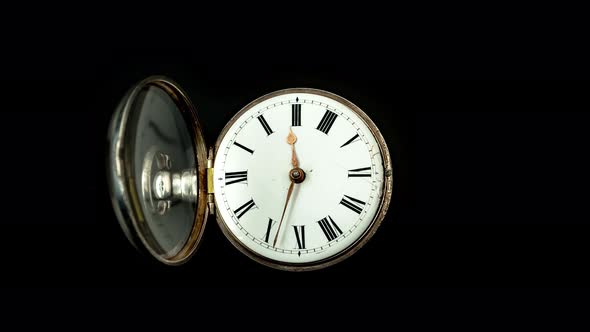 Running Second Hand on an Old Pocket Watch with a White Dial. Close Up. Timelapse. Back Background