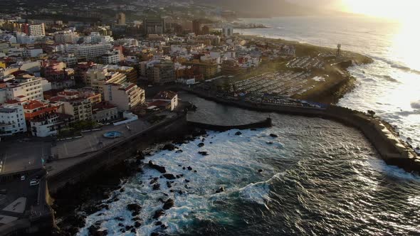 Sunset flight at Puerto de la Cruz, city in Tenerife, Canary Islands, Spain