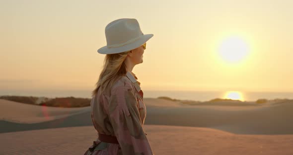 Golden Hour Footage. Slow Motion Woman Enjoying Golden Sunset Over Ocean