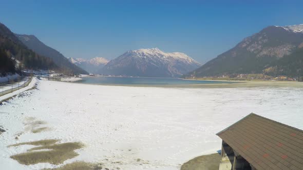 Abandoned Dock and Mooring for Boats, Low Water Level in Alpine Mountain Lake