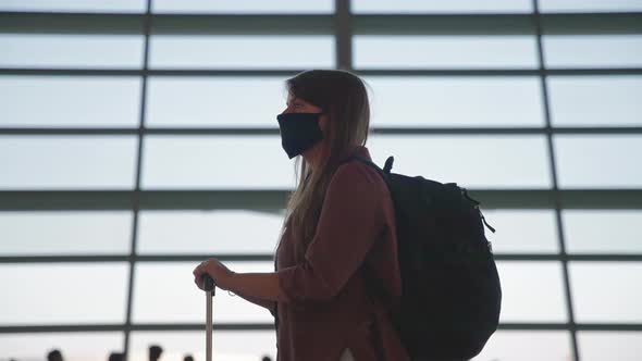 Young woman waiting for her flight