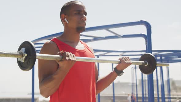 Side view man with prosthetic leg exercising