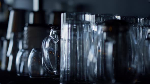 Bartender Clean Cocktail Glasses for Various Drinks Closeup