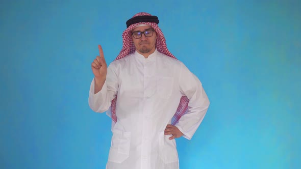 Arab Man Expresses Disapproval on Blue Background