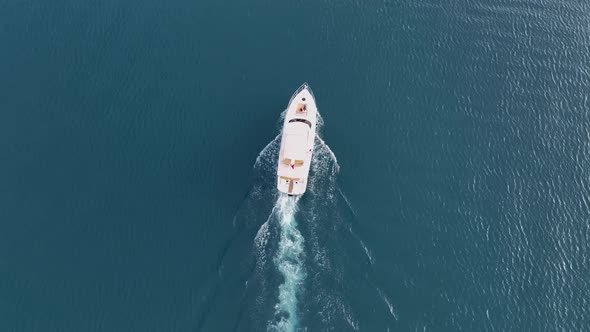 A couple rides a yacht aerial view 4 K Turkey Alanya