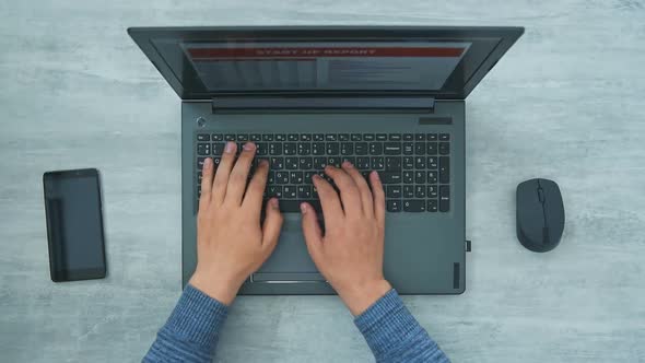 Businessman Using Laptop And Counting Profit