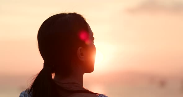 Woman enjoy the sunset