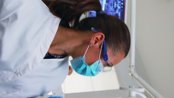 Vertical Video Patient Pov in Dental Chair Making Periodic Teeth Check