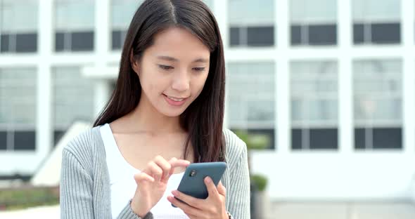 Woman work on cellphone