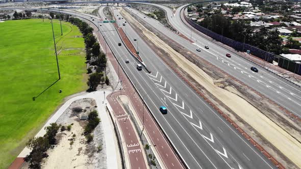 Aerial View of a Busy Freeway near an Oval in Australia