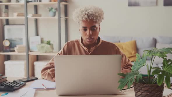 Pensive Afro Woman Work on Laptop Look in Window Distance Thinking Making Plans