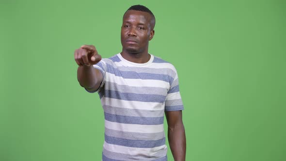 Young African Man Pointing Finger