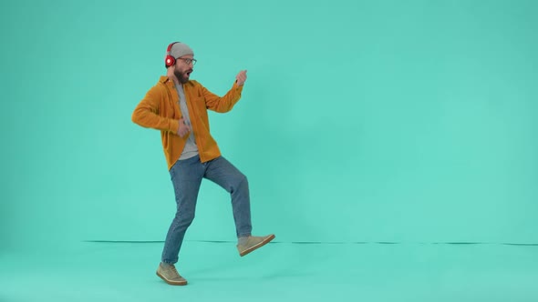 Joyful Man Dancing with Imaginary Bass Guitar