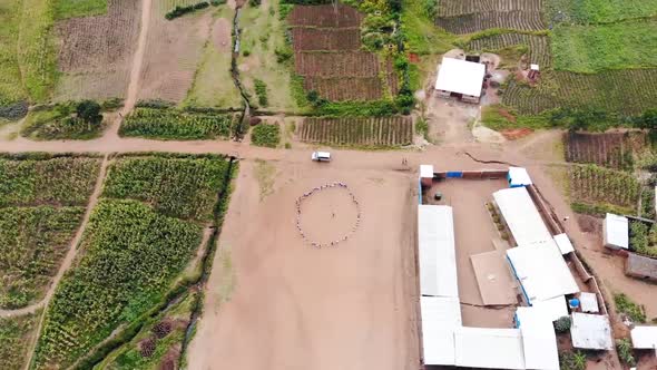 People Standing in Circle in School Playground in Malawi, Africa, Drone View