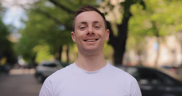 Slow Motion Portrait of Happy Caucasian Man Smiling