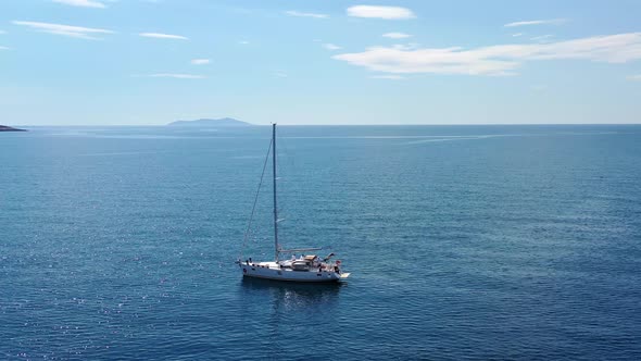 Aerial View of a Sailboat in Adriatic Sea Near Croatia at Summer Day