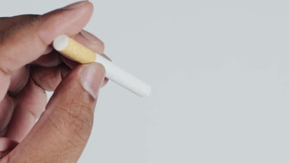 Macro Cigarette In Hand  