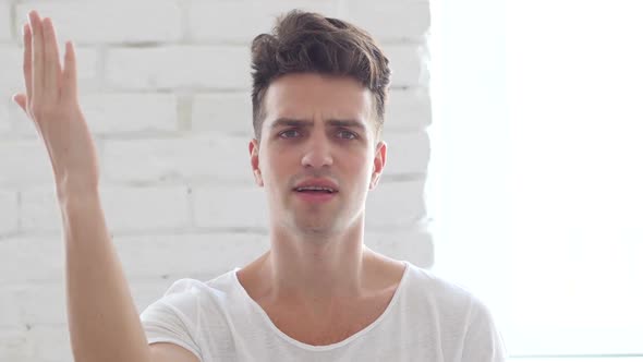 Frustrated Angry Man Yelling, Sitting in Office