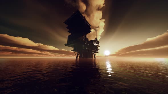 Aerial View Offshore Drilling Rig at the Offshore Location During Sunset