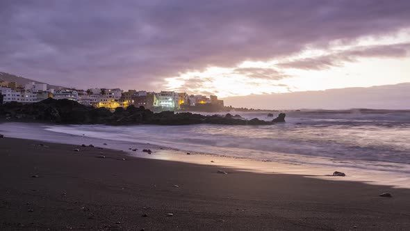 Beach and ocean waves after sunset