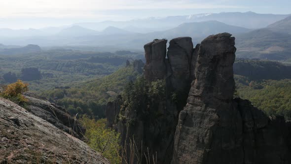 Old group of rocks near town of Belogradchik  slow tilt 4K 2160p 30fps UltraHD footage - Valley with