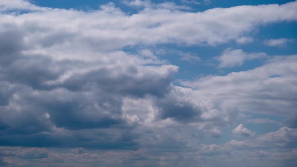 Cumulus Clouds Move in the Blue Sky Cloudscape Timelapse