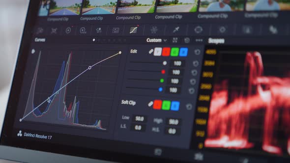 Color correction post production. Videographer editing footage on post production software