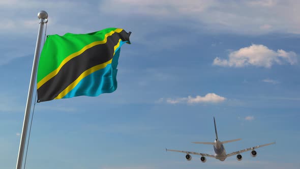 Commercial Airplane Flying Over Flag of Tanzania alt