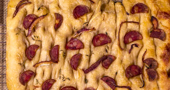 Traditional Italian Focaccia with pepperoni, cherry tomatoes, black olives, rosemary ando onion - ho