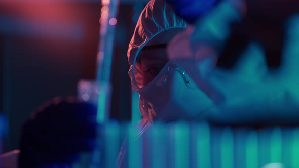 A Doctor is Developing Vaccine or Conducting Experiment in Lab alt