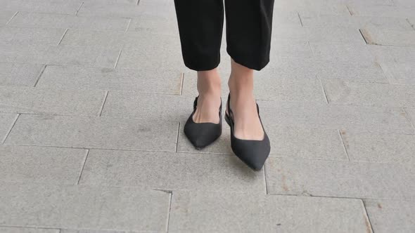 Front View of Walking Female Feet