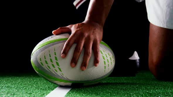 Professional rugby sportsman take the ball